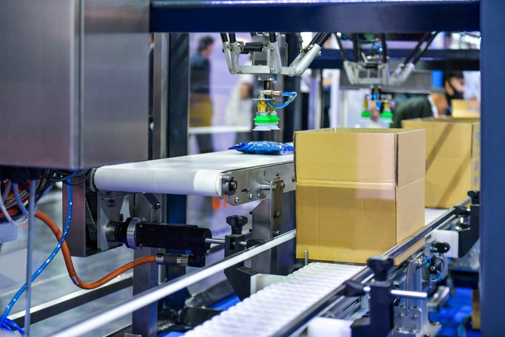 Cardboard boxes on conveyor belt. parcels transportation system concept Cardboard boxes on conveyor belt. parcels transportation system concept