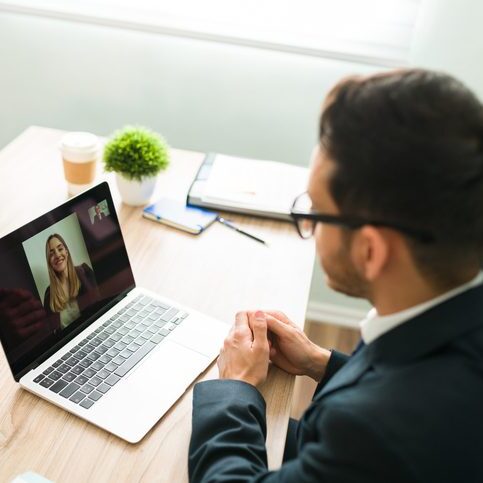 SaaS Sales Recruiter doing an online interview with a female applicant SaaS Sales Recruiter doing an online interview.